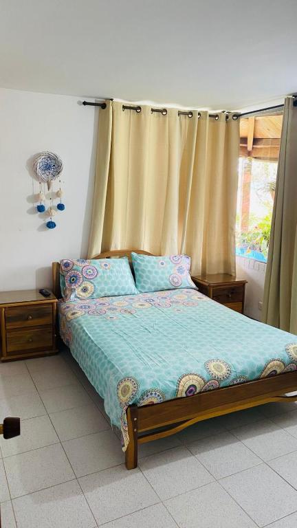Postel nebo postele na pokoji v ubytování CHALET SANTORINI