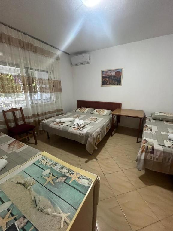 Postel nebo postele na pokoji v ubytování Vila Bella