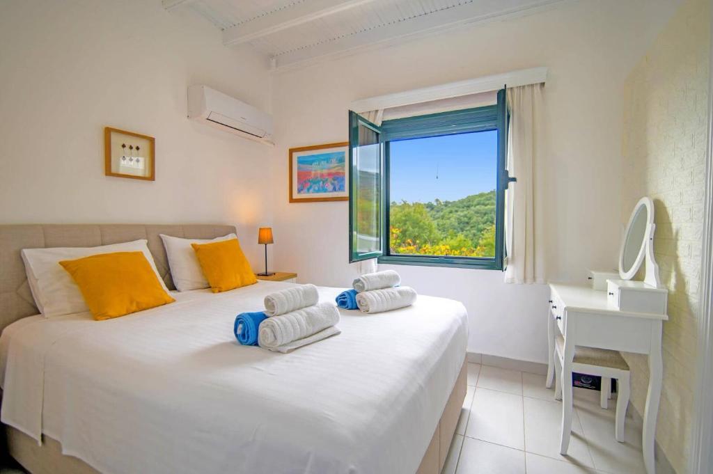 Posteľ alebo postele v izbe v ubytovaní Villa Venetia by Villa Plus
