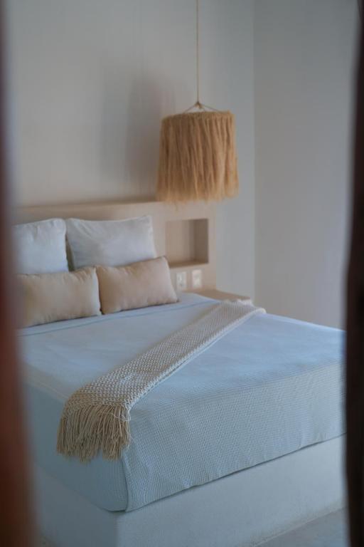 Postel nebo postele na pokoji v ubytování Mis Sueños Holbox
