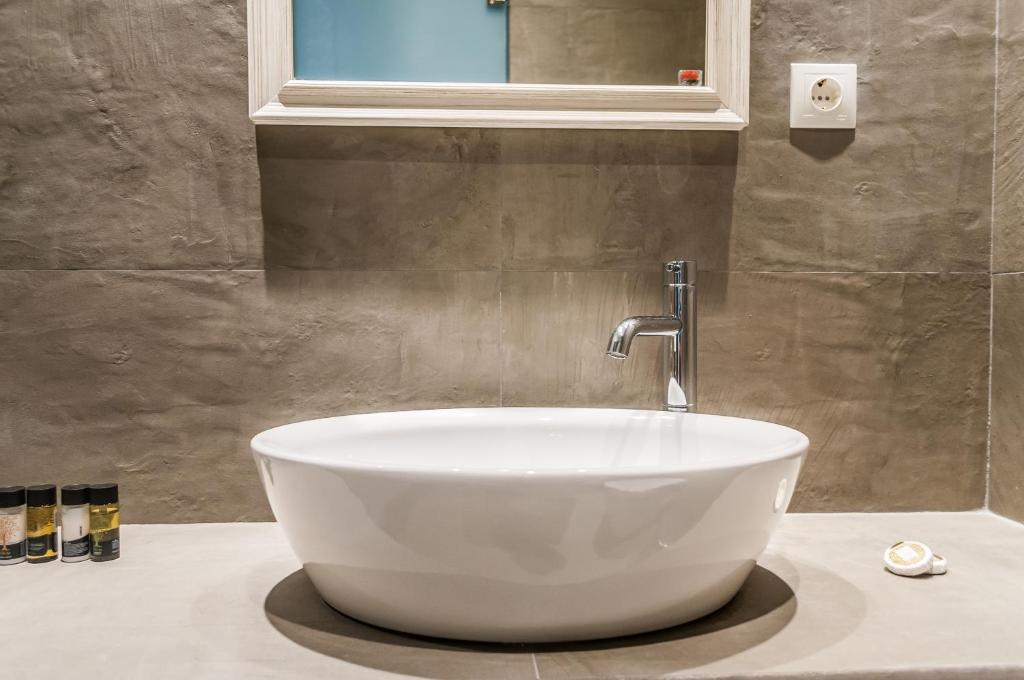 Koupelna v ubytování Vilos Suites