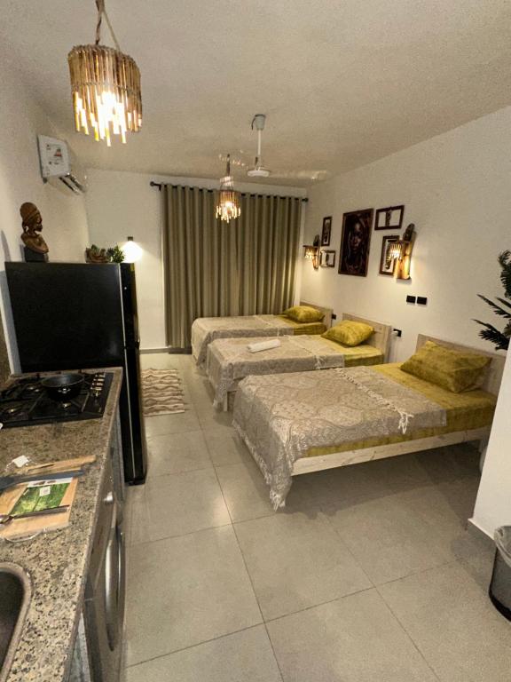 Postel nebo postele na pokoji v ubytování Noah House Dahab