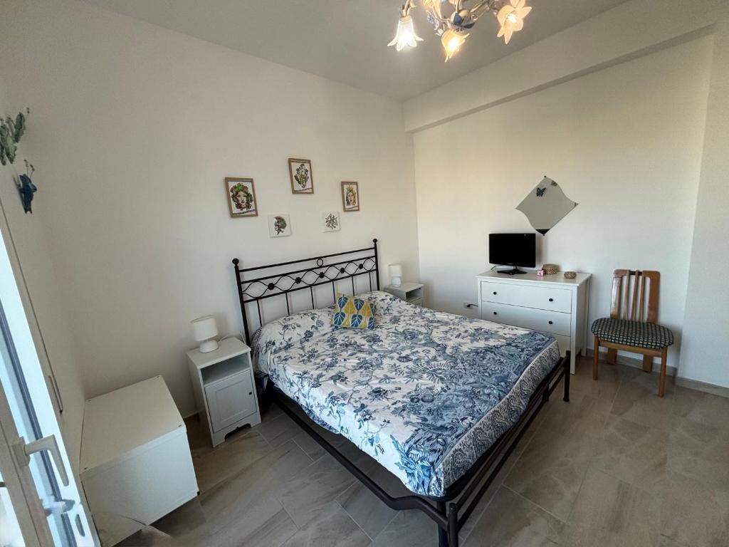 Letto o letti in una camera di Andrea's Home