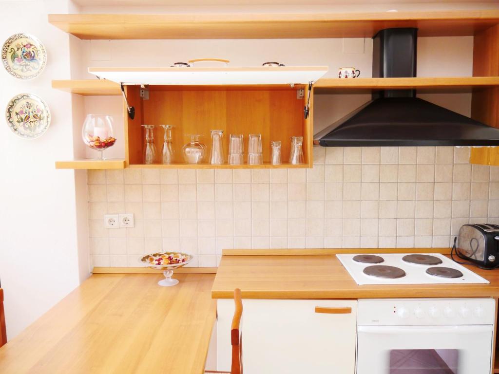 Kuchyňa alebo kuchynka v ubytovaní Villa Victoria Boutique Apartments
