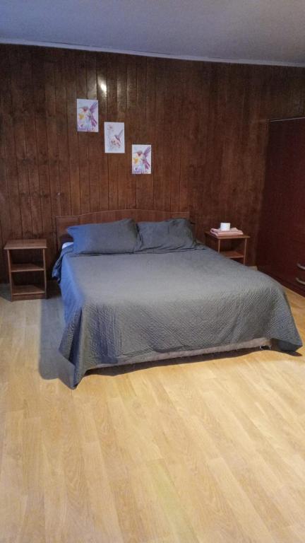 Postel nebo postele na pokoji v ubytování Hostal Fx