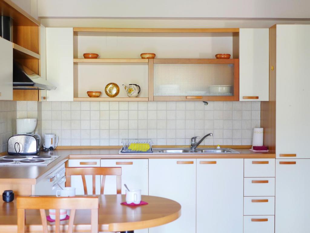 Kuchyňa alebo kuchynka v ubytovaní Villa Victoria Boutique Apartments