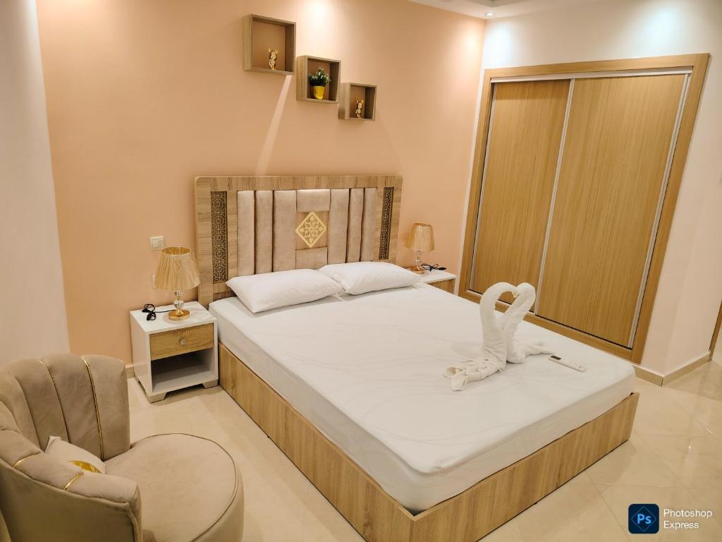 Ένα ή περισσότερα κρεβάτια σε δωμάτιο στο Appartement de 3 chambres avec piscine et climatiseur sur la Plage de Achakar
