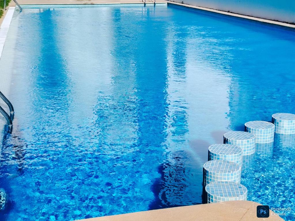 Πισίνα στο ή κοντά στο Appartement de 3 chambres avec piscine et climatiseur sur la Plage de Achakar