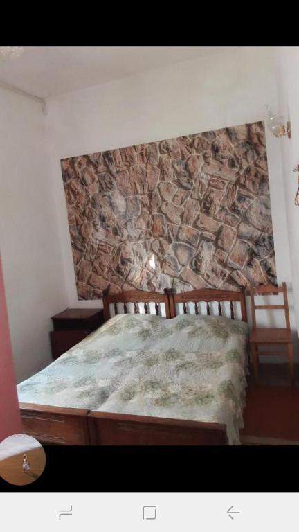 Postel nebo postele na pokoji v ubytování Guest House Buche 219