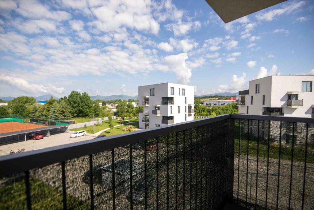 Balkón nebo terasa v ubytování New Cosy Apartment, close to TATRALANDIA and JASNA, parking