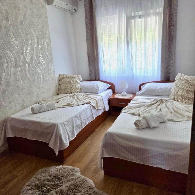 Postel nebo postele na pokoji v ubytování VILA MARIJA