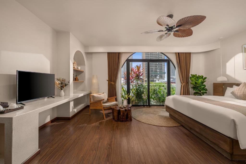 Giường trong phòng chung tại Saha Casa Boutique Hotel Da Nang
