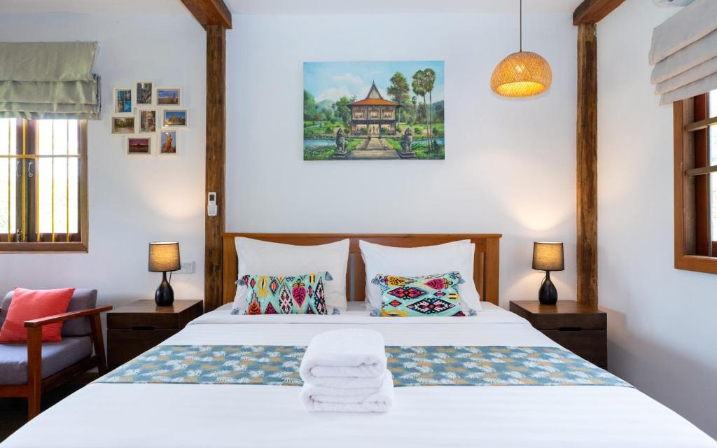 Postel nebo postele na pokoji v ubytování Beng Mealea Lodge