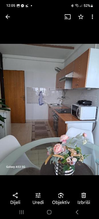 Kuchyň nebo kuchyňský kout v ubytování Apartman Panorama