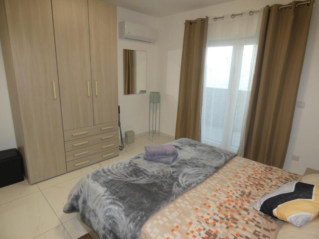 Postel nebo postele na pokoji v ubytování Terrace View - A Stylish Two Bedrooms Penthouse AC-WIFI