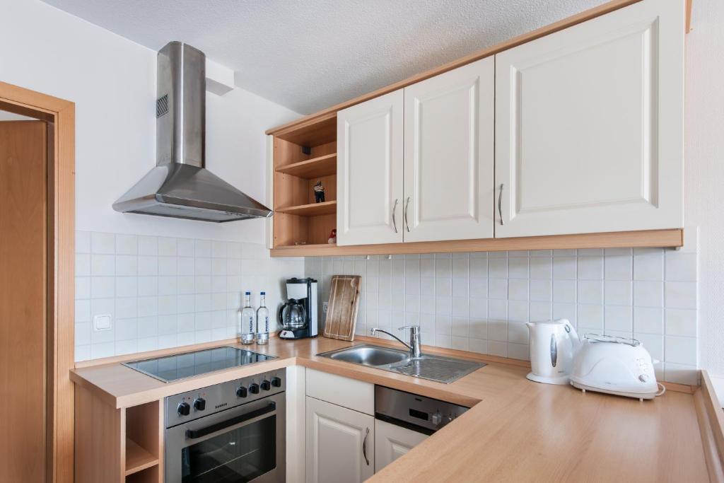 Kuchyň nebo kuchyňský kout v ubytování Friesenhaus Sylter Domizil