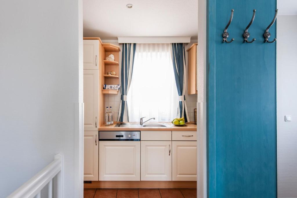 Kuchyň nebo kuchyňský kout v ubytování Friesenhaus Sylter Domizil