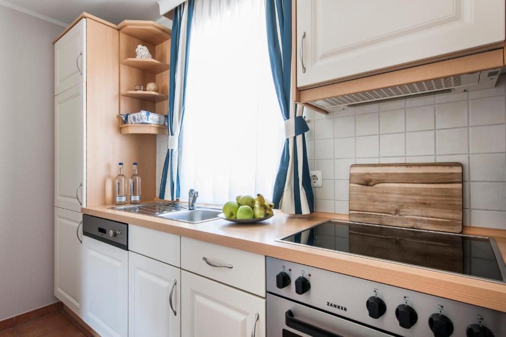 Kuchyň nebo kuchyňský kout v ubytování Friesenhaus Sylter Domizil