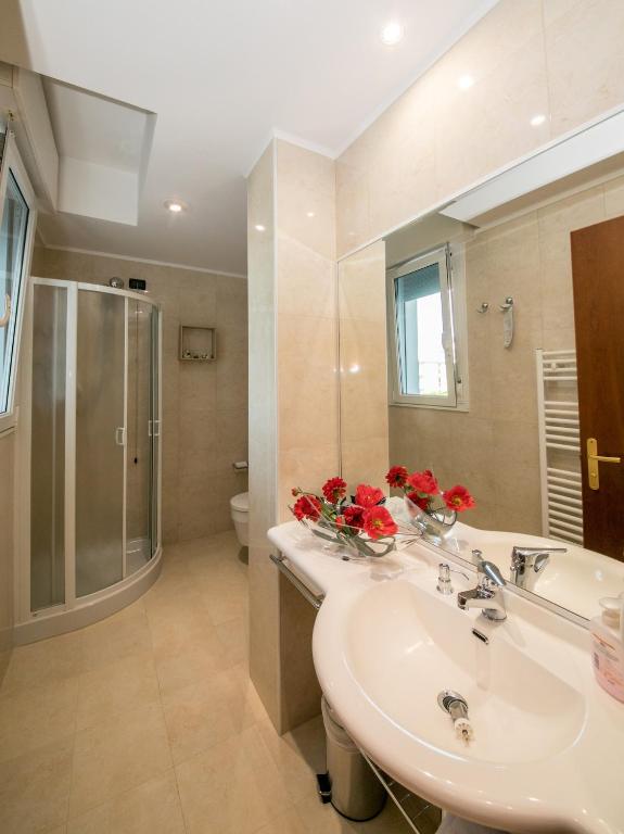 Koupelna v ubytování Hotel Helios