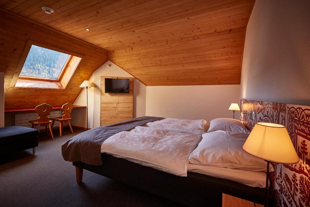 Postel nebo postele na pokoji v ubytování Hotel Landhaus