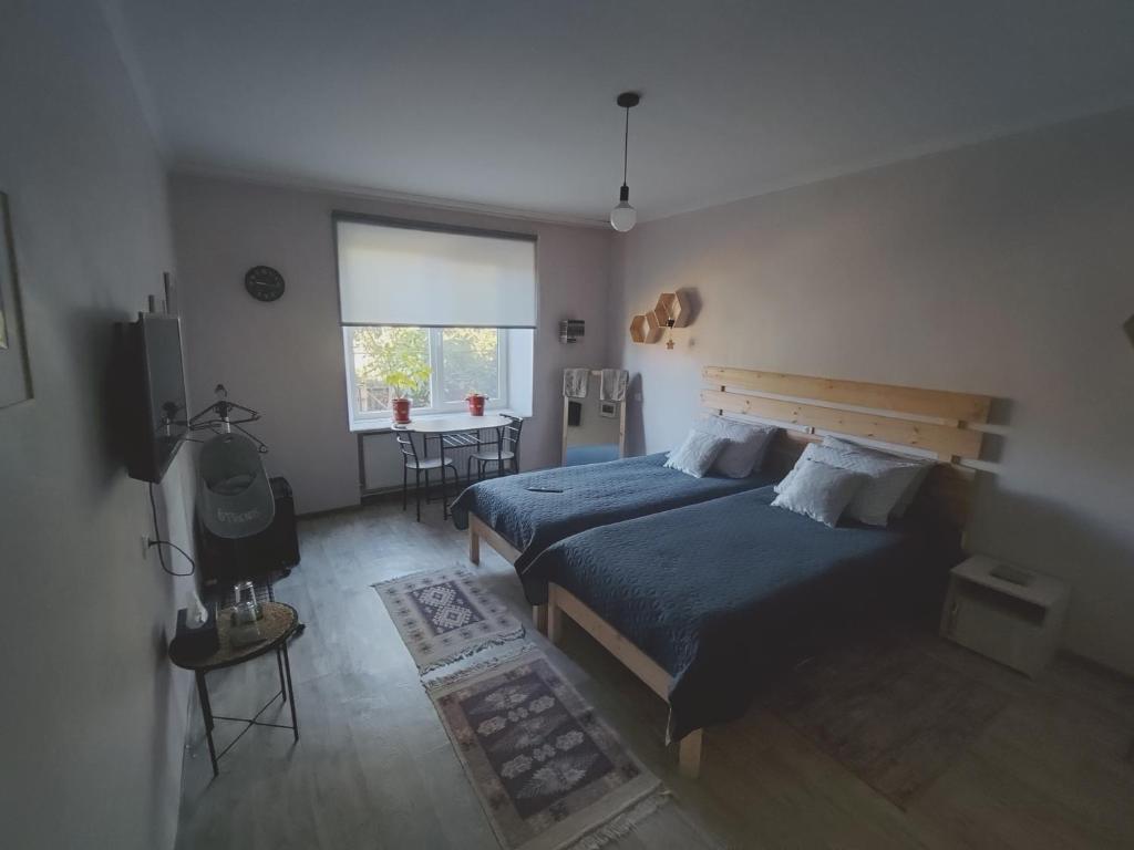 Postel nebo postele na pokoji v ubytování Le Rustique