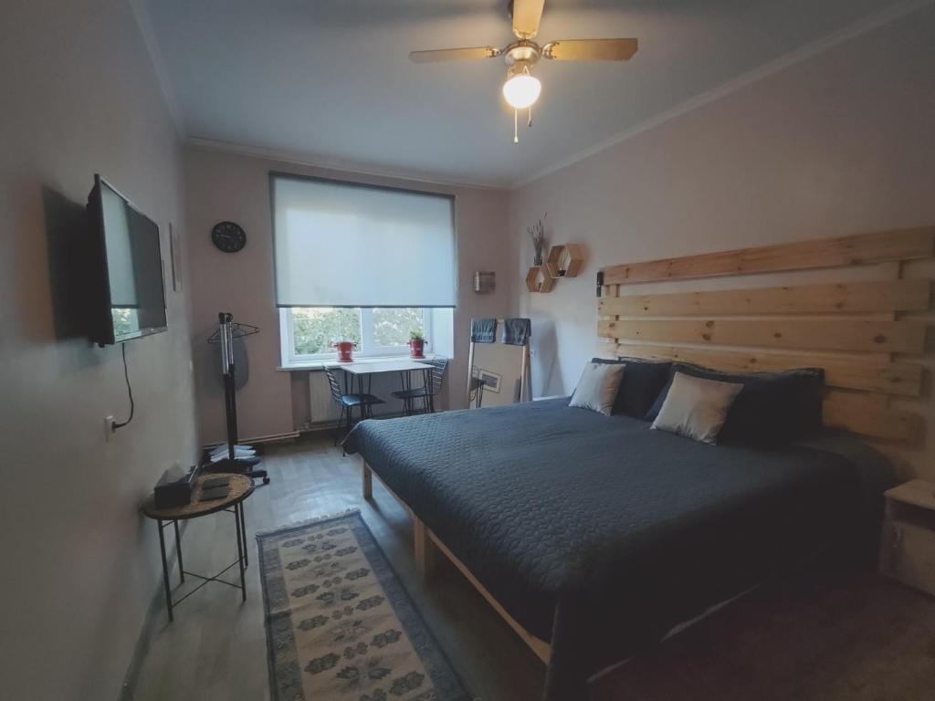Postel nebo postele na pokoji v ubytování Le Rustique