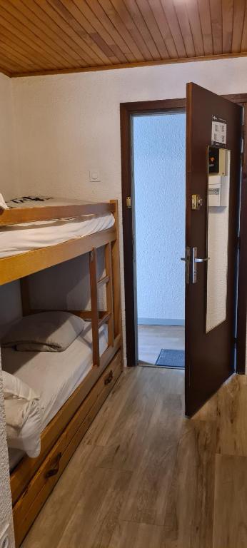 Postel nebo postele na pokoji v ubytování Eperon 1