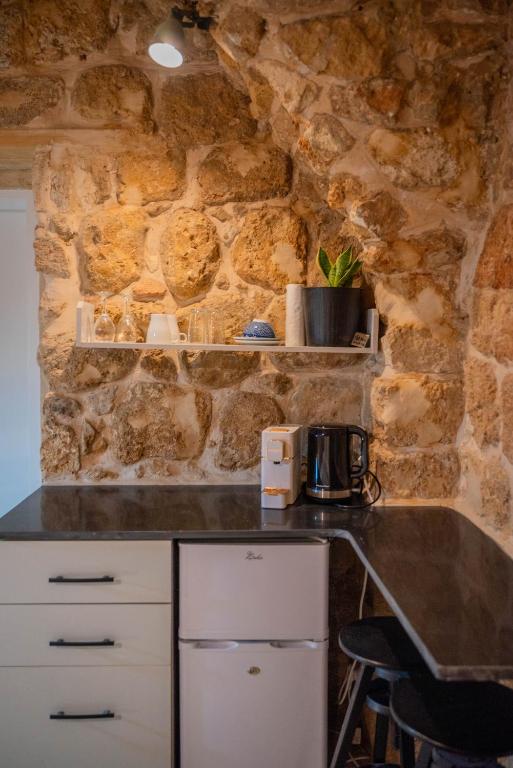Kuchyň nebo kuchyňský kout v ubytování Nov Antique - AKKO