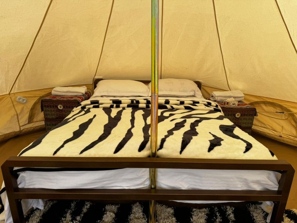 Postel nebo postele na pokoji v ubytování Aghdepat Glamping