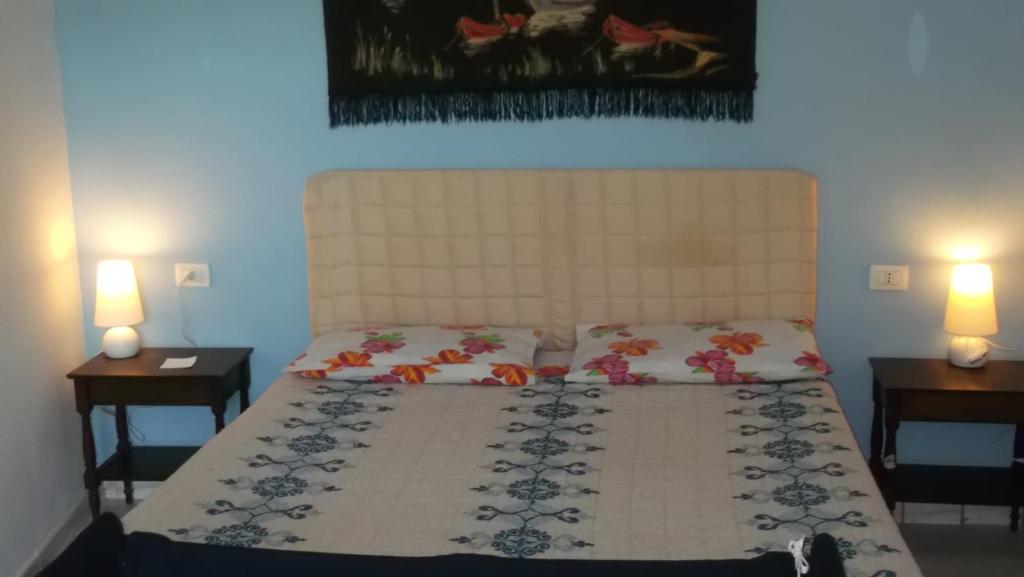 Postel nebo postele na pokoji v ubytování Solimarina