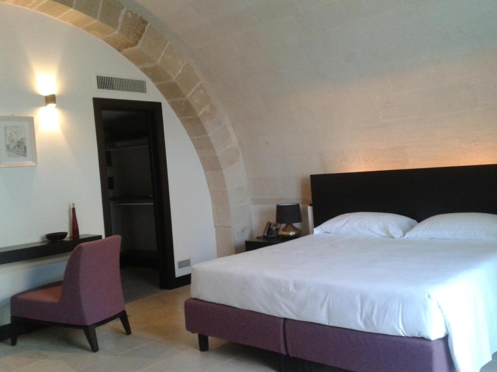 Postel nebo postele na pokoji v ubytování Masseria Bagnara Resort & Spa