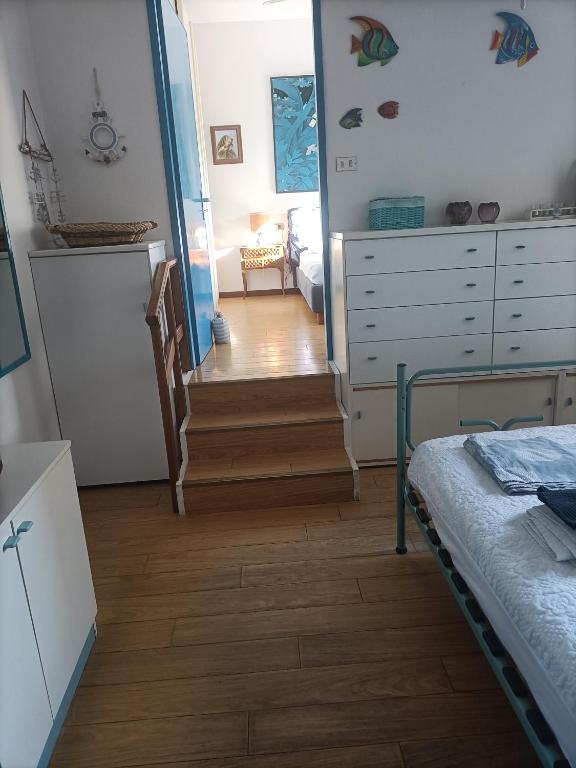Posteľ alebo postele v izbe v ubytovaní relax e atmosfera di mare
