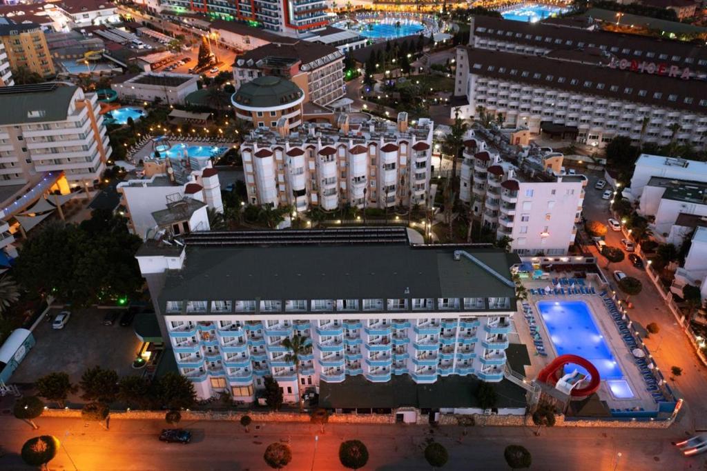 an overhead view of a building in a city at night at Mysea Hotels Incekum - All Inclusive in Avsallar
