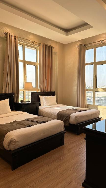 Postel nebo postele na pokoji v ubytování Le Park Hotel