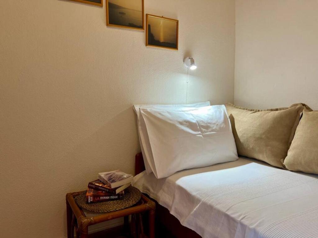 Postel nebo postele na pokoji v ubytování Holihome Beach Toroni