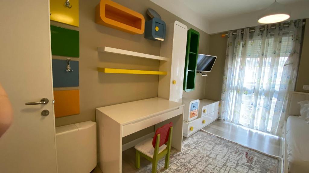 TV a/nebo společenská místnost v ubytování Lake Drive Rooms&Apartments