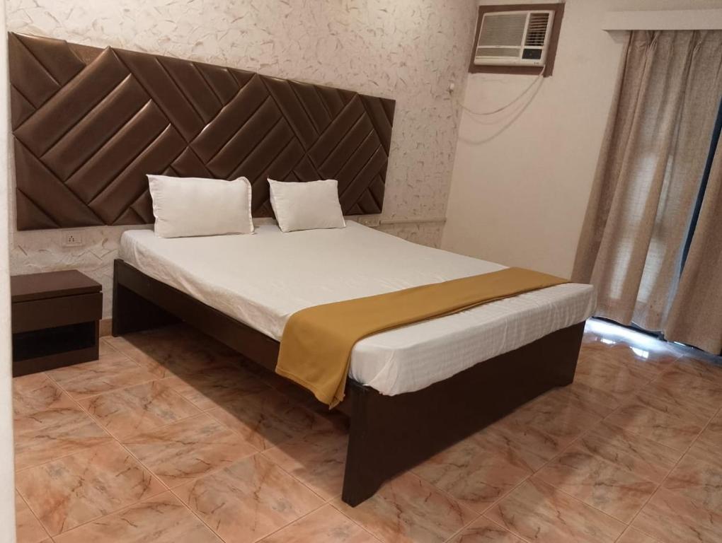 Postel nebo postele na pokoji v ubytování Abalone Resort