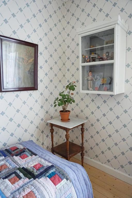 Postel nebo postele na pokoji v ubytování Åsens By