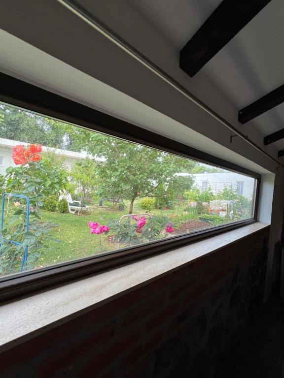 a window in a room with a view of a garden at Villa SHU in Krimovice