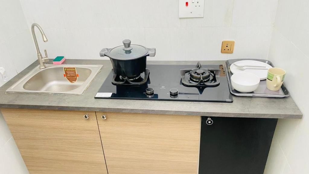 Kuchyň nebo kuchyňský kout v ubytování Petalz Home