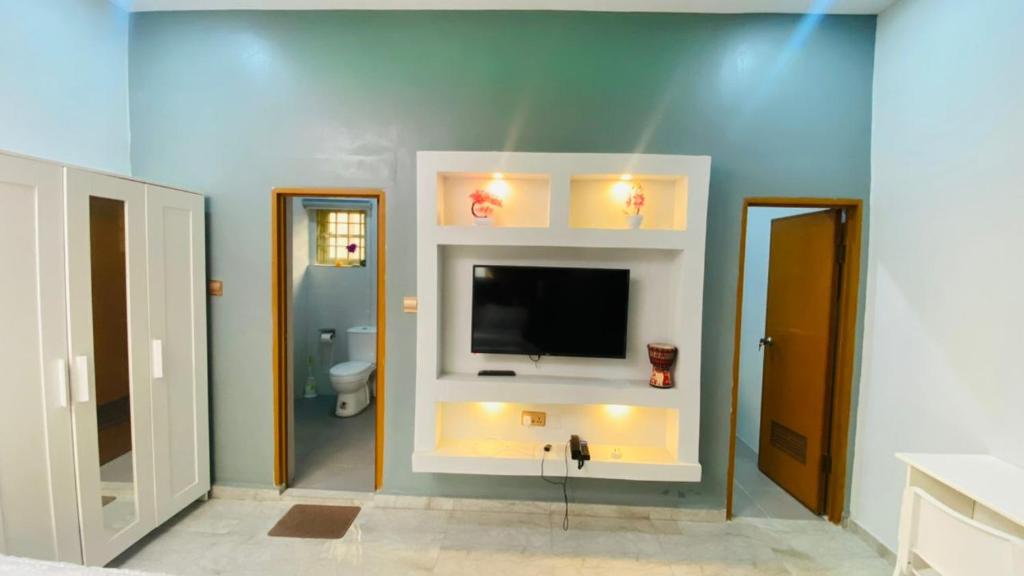 TV a/nebo společenská místnost v ubytování Petalz Home
