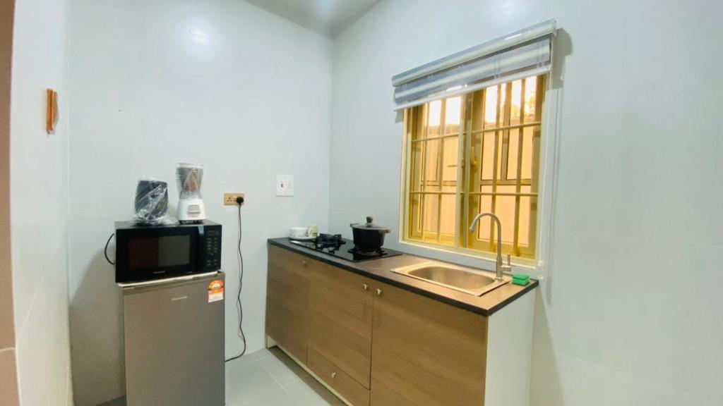 Kuchyň nebo kuchyňský kout v ubytování Petalz Home