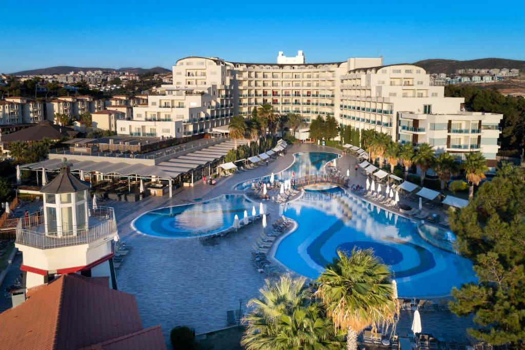 an aerial view of a resort with a pool at Sealight Resort Hotel in Kuşadası