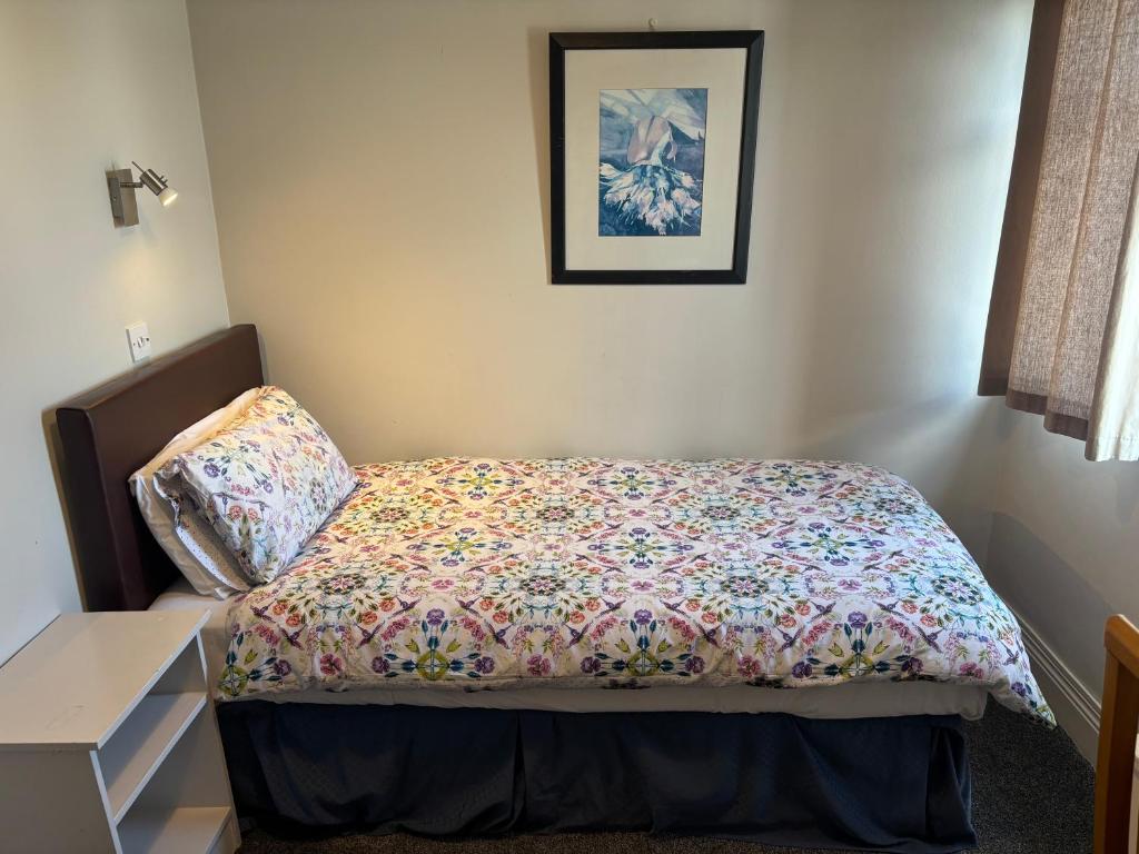 Letto o letti in una camera di Harmony Inn - Glena House