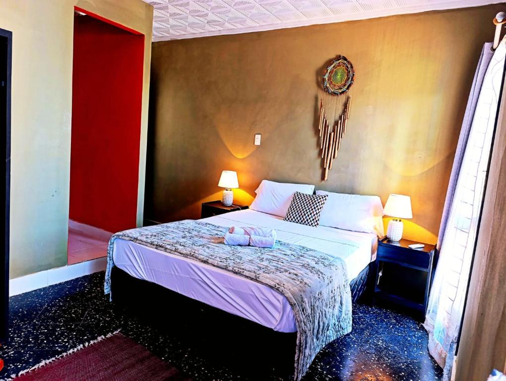 Postel nebo postele na pokoji v ubytování Executive Suite with Balcony and Veranda