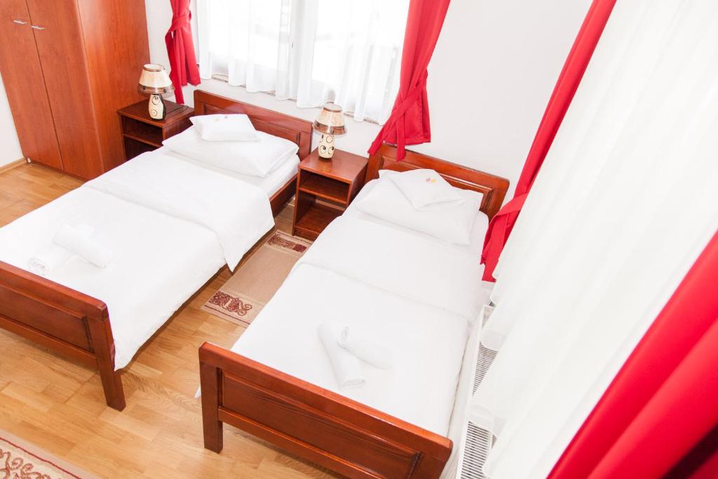 Postel nebo postele na pokoji v ubytování Apartments Bramado