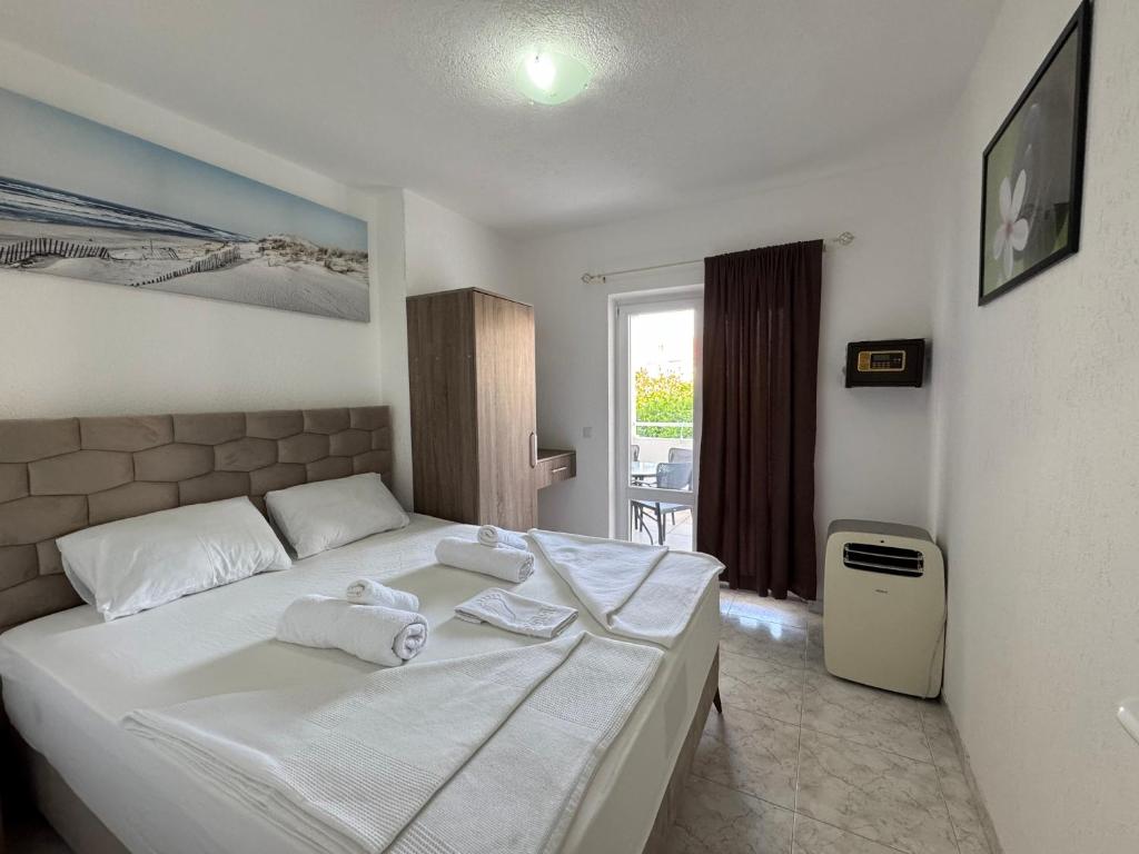 Krevet ili kreveti u jedinici u okviru objekta Apartmani Hadžić