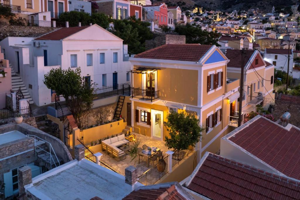 an aerial view of a city at night at Elpidas Apartments in Symi