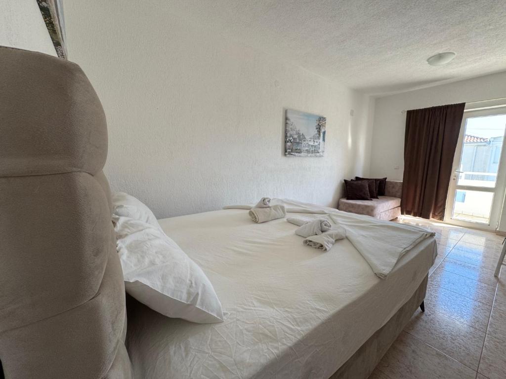 Krevet ili kreveti u jedinici u okviru objekta Apartmani Hadžić