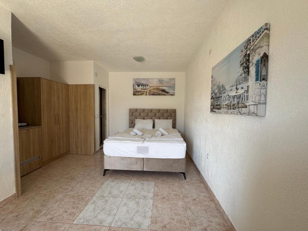 Krevet ili kreveti u jedinici u okviru objekta Apartmani Hadžić